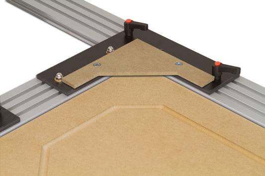 Corner chamfer template on a MDF door frame jig
