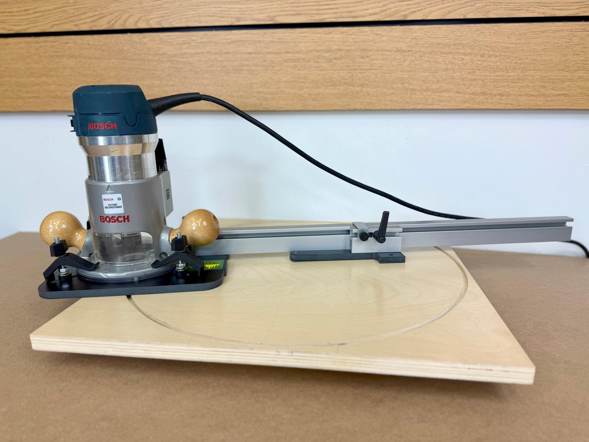 Bosch router cutting a a wooden circle