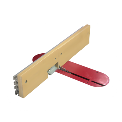 A box joint jig made of aluminum, shown disassembled into two pieces with a red and silver color scheme. The device is designed for woodworking to create box joints between various sizes.
