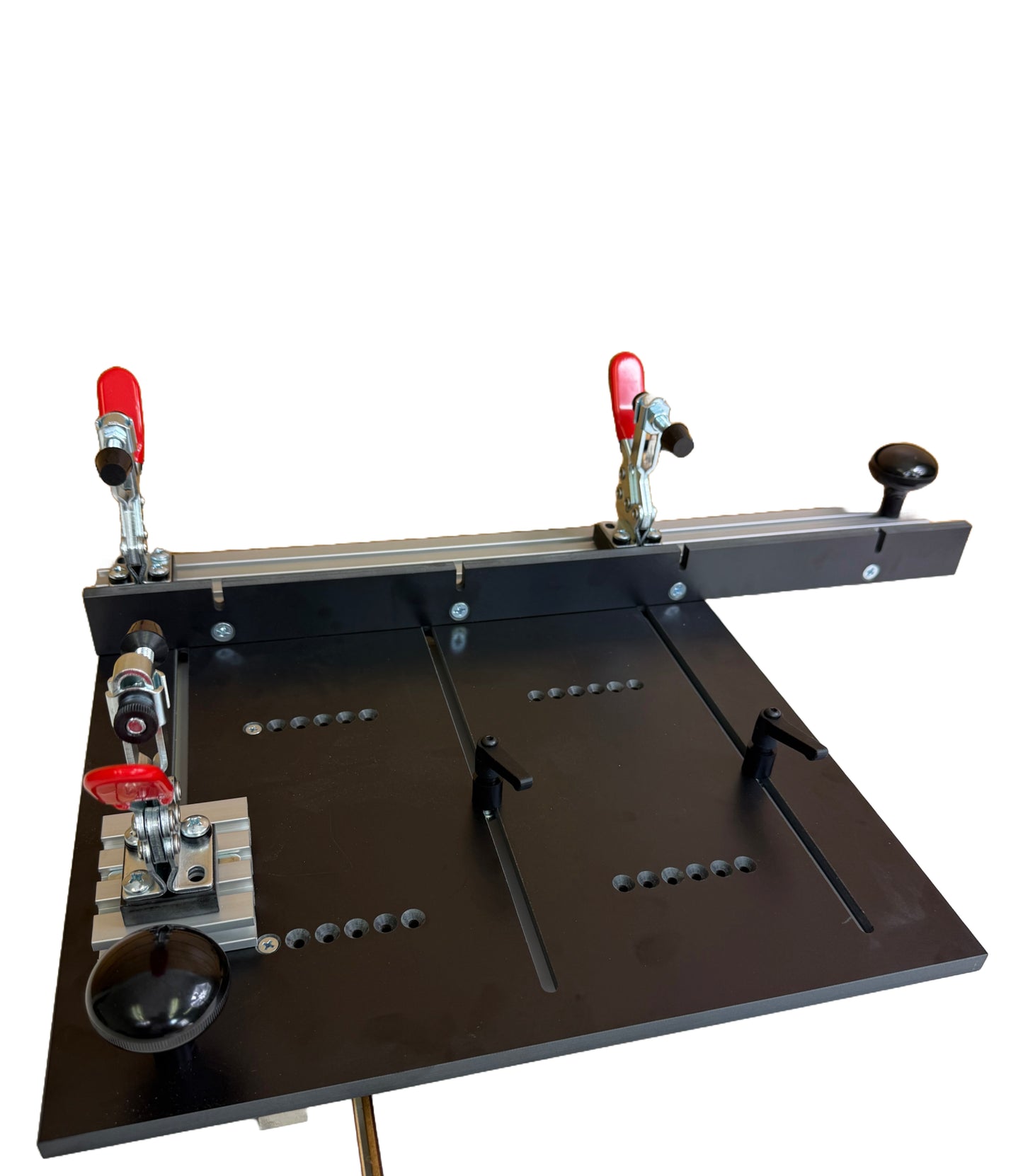 Router table with clamps on a white background