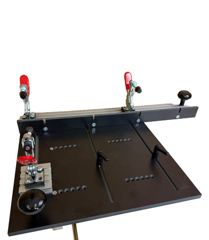 Router table with clamps on a white background