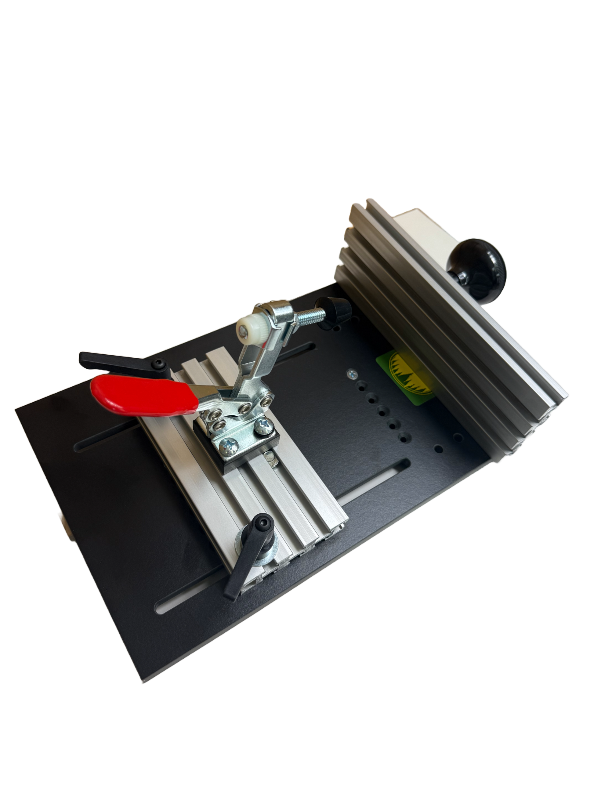 Small band saw sled with a red handled clamp 