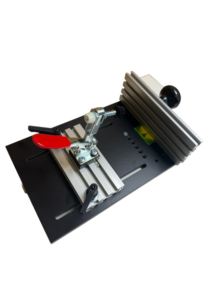 Small band saw sled with a red handled clamp 