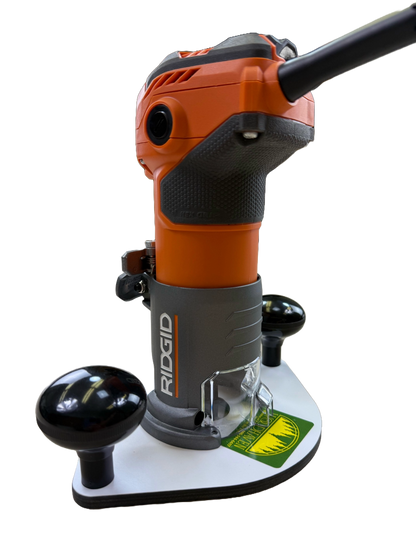Ridgid router on a white baseplate with two handles