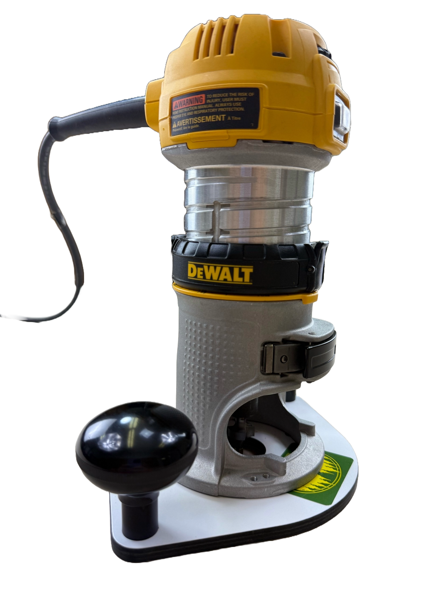 DeWalt router on a white auxiliary base plate