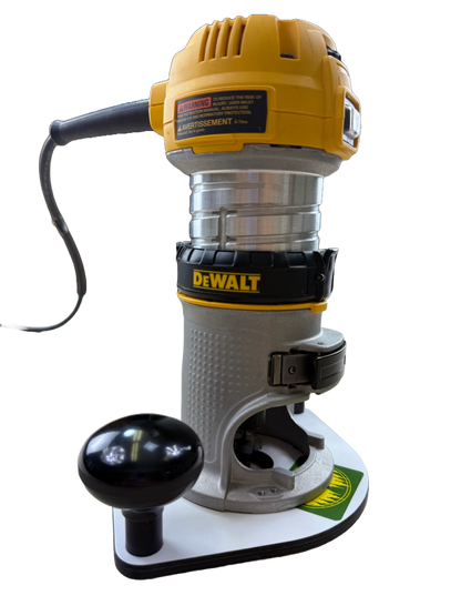 DeWalt router on a white auxiliary base plate