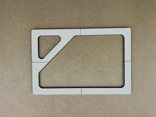 Phenolic template outlining a rectangle cutting board