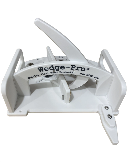 A white segmented circle cutting sled with the Wedge-Pro brand name on it.