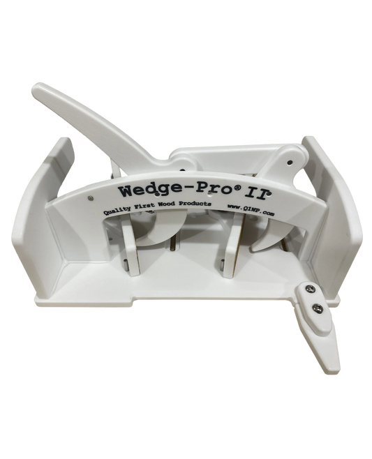 A white segmented circle cutting sled with labels and components, designed for use with a table saw.