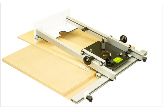 Woodhaven scarfing sled in use making a long angled scarf joint cut with a router