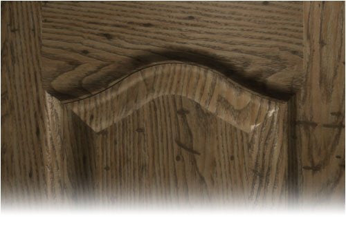 Close-up view of a wooden cathedral door template with a curved shape