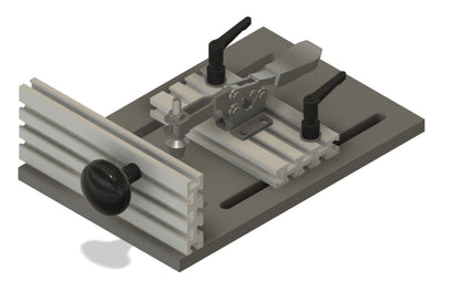 A small band saw sled made up of metal with a gray phenolic base, ultra track, and an adjustable steel miter bar, designed to hold materials for cutting with a band saw.
