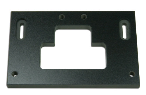 Strike plate jig positioned on door jamb showing template alignment